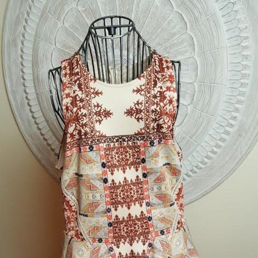 Dress: Multi-colored burnt org/black Aztec dress.